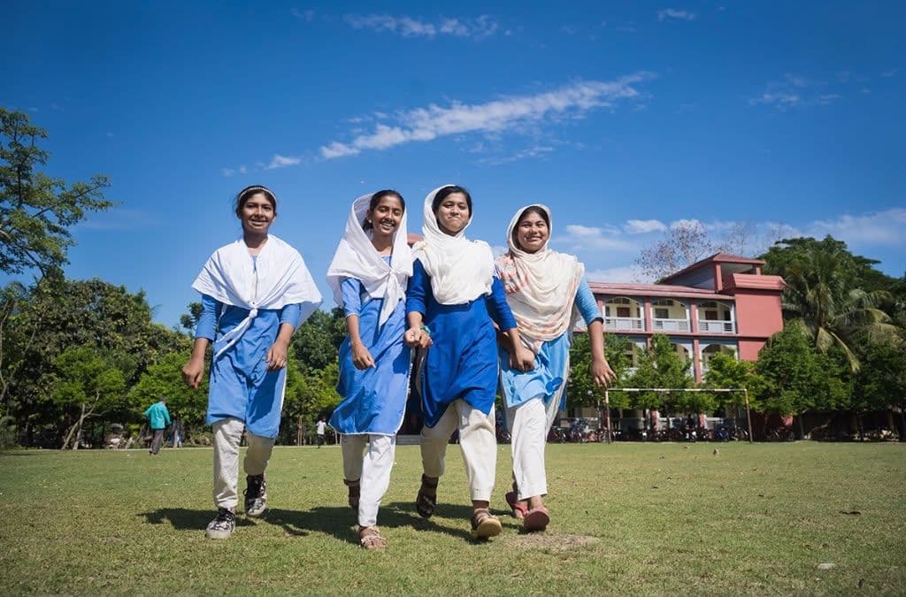 Schoolgirls walking together